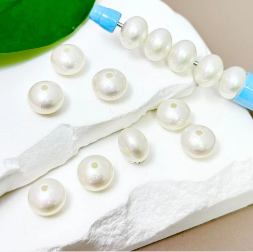 Bead and Spacers with Artificial Pearls