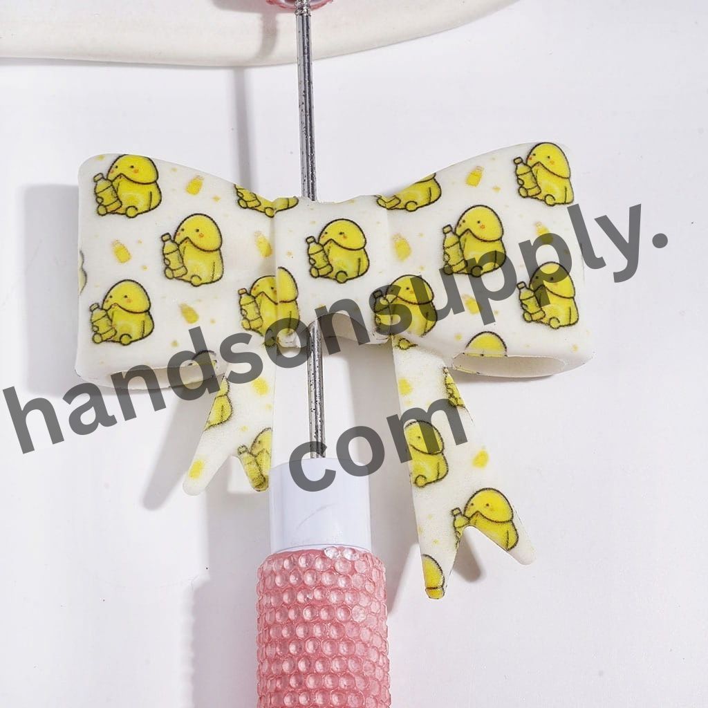 UV-Printed Cheerful Yellow Man Exclusive with Drink Bottle Design Soft Bowtie Shape Silicone Focal Beads, 53*59MM