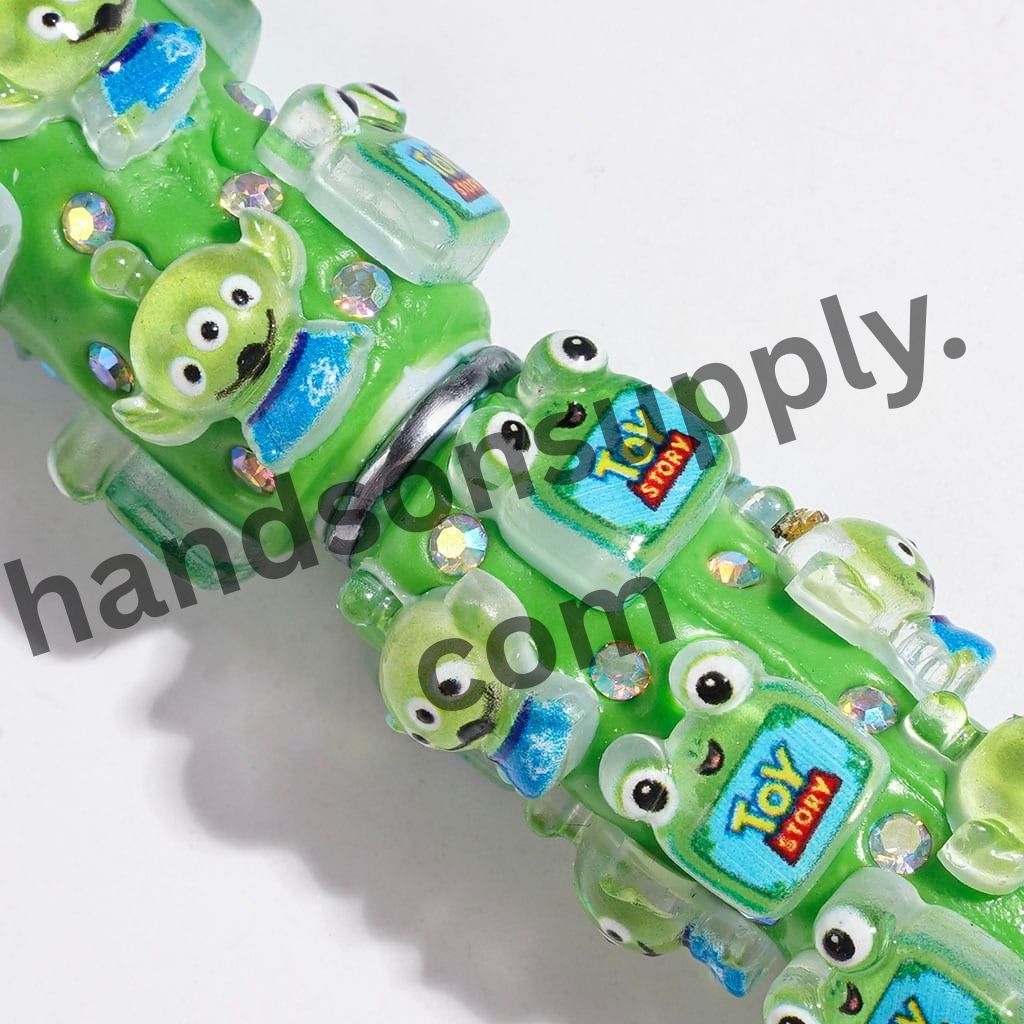 Colorful Toy Adventure Characters with Sparkling AB Rhinestones on Green Beadable Clay Pen