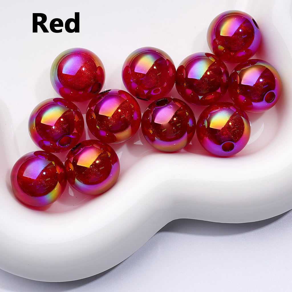 Red iridescent beads on a white dish with 'Red' text above.