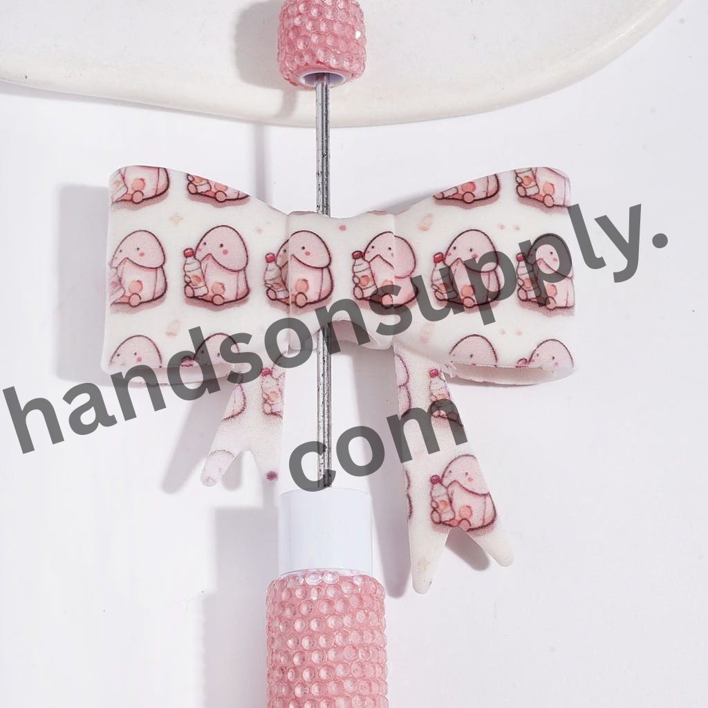 UV-Printed Playful Pink Man Exclusive with Bottle Design Soft Bowtie Shape Silicone Focal Beads, 53*59MM
