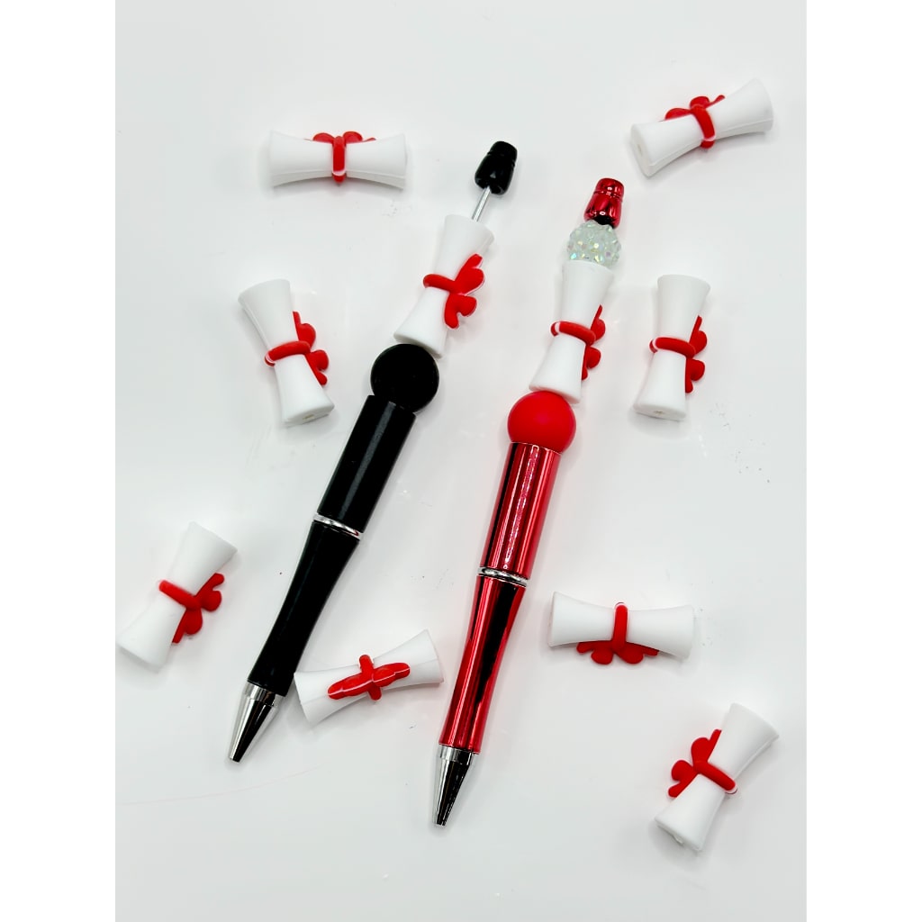 3D White Scroll Reel with a Red Bowtie Silicone Focal Beads
