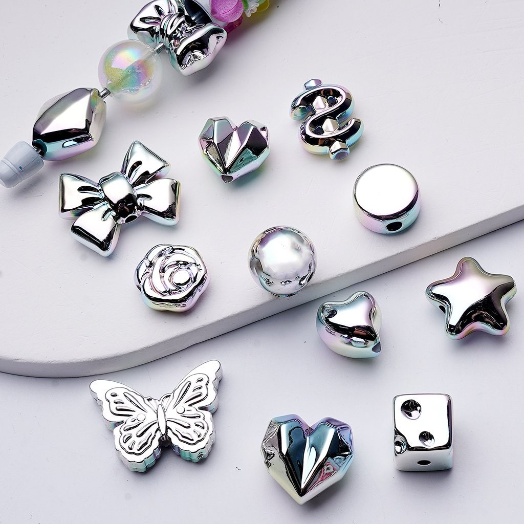 Acrylic Beads Random Mix – Iridescent Galaxy Silver Shapes Like Stars, Hearts, Butterflies, Dollar Signs & More