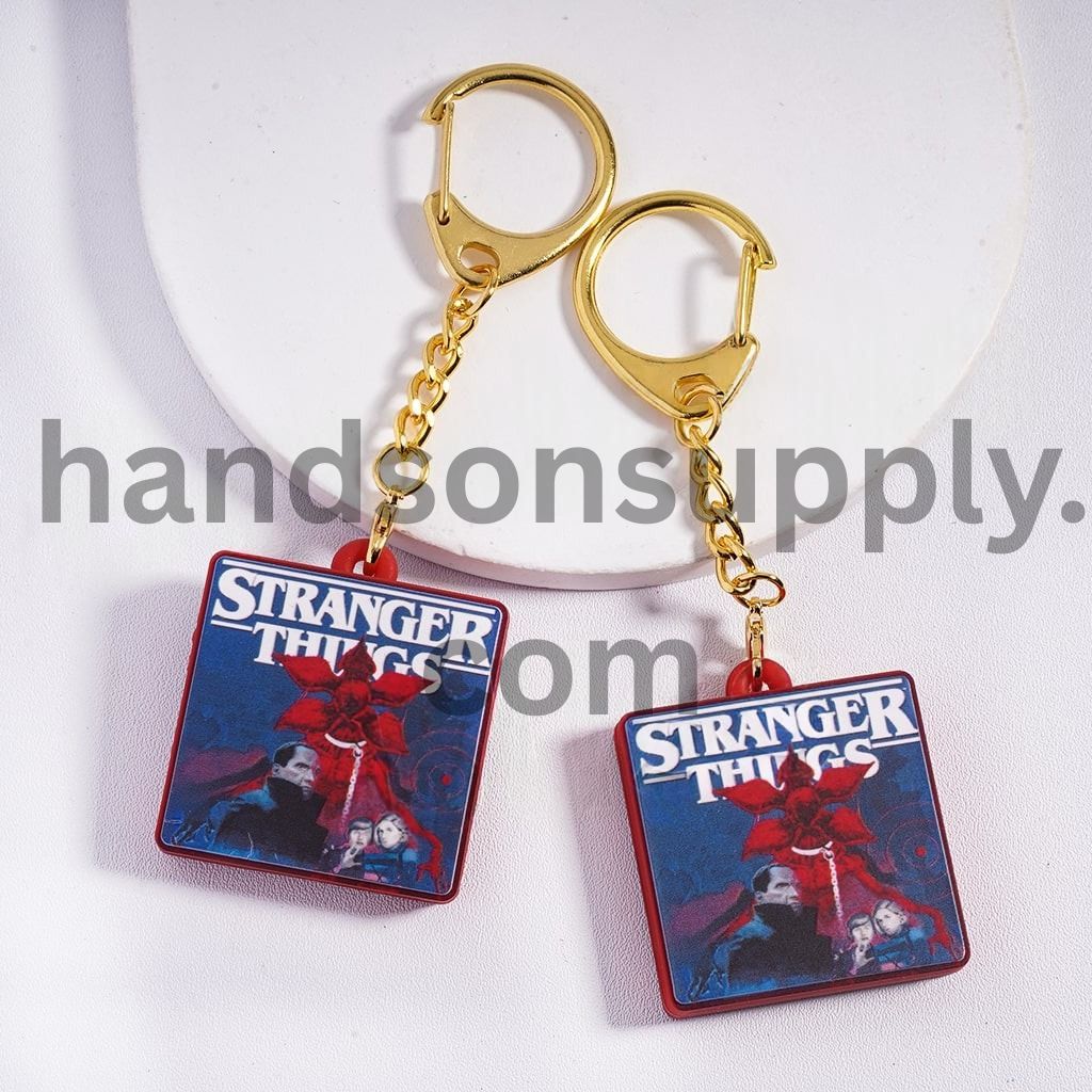 Flat Square Shape Metal Keychain with Gold Lobster Clasp Dark Fantasy Character Design Horror Style
