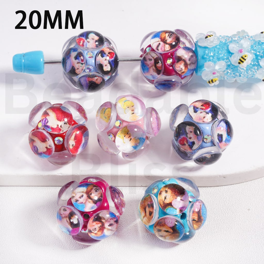 Set of colorful beads with character designs on a white background
