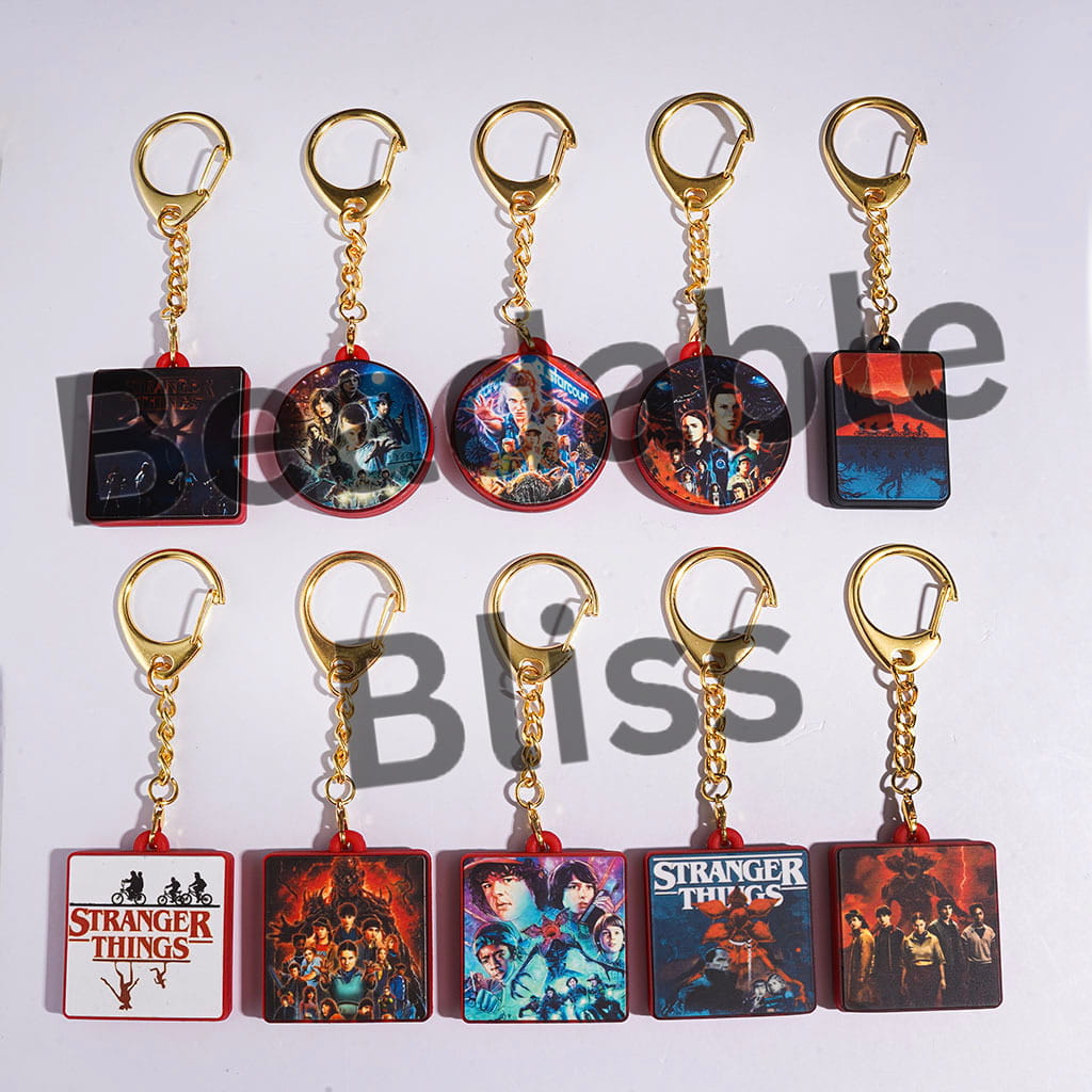 Metal Keychain with Lobster Clasp with Silicone Charm Pendant Strange World Character Series, Random Mix