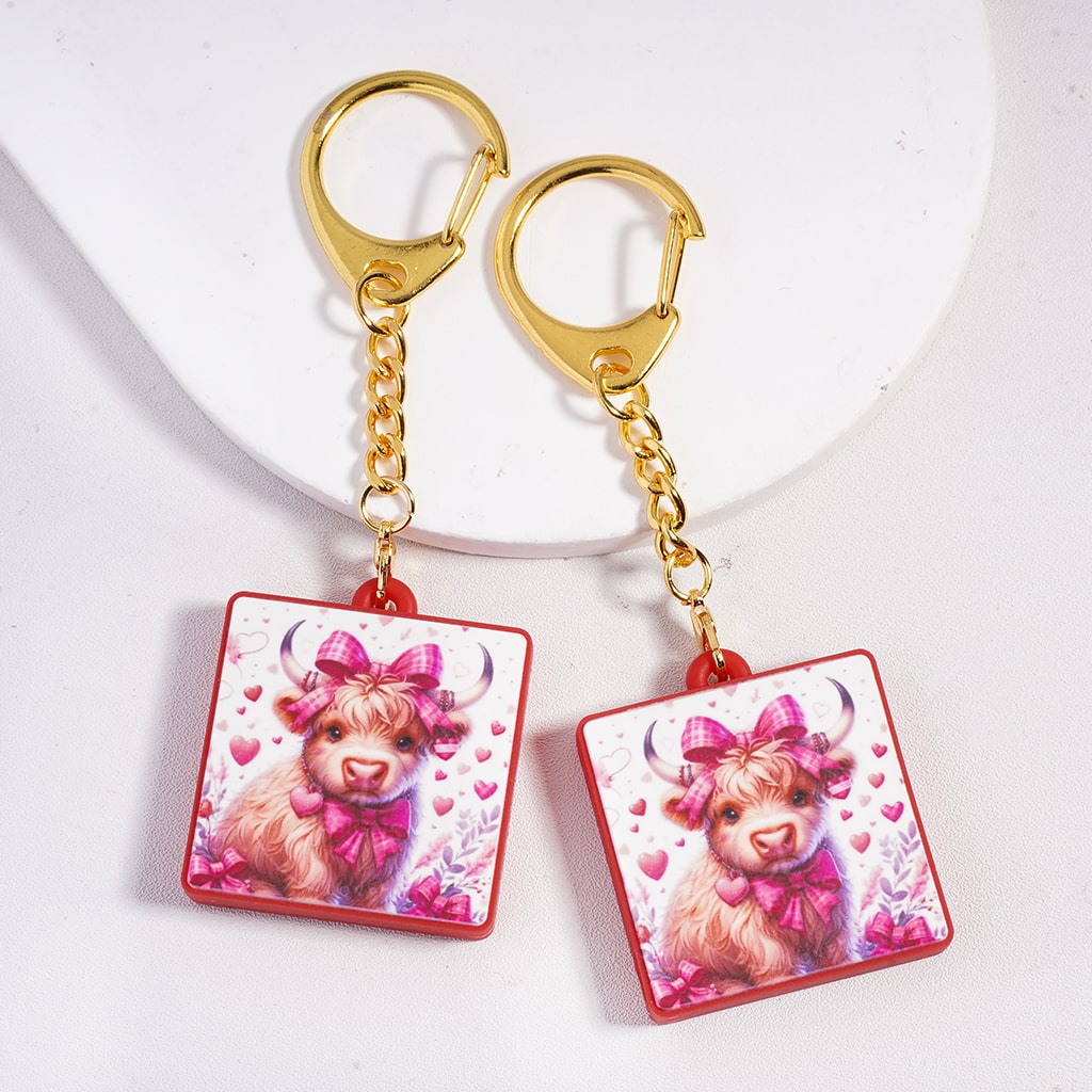 Highland Cow w Pink Checkered Pattern Bowties & Hearts Valentine's Day Theme Flat Square Shape Silicone Metal Keychain Charm with Gold Color