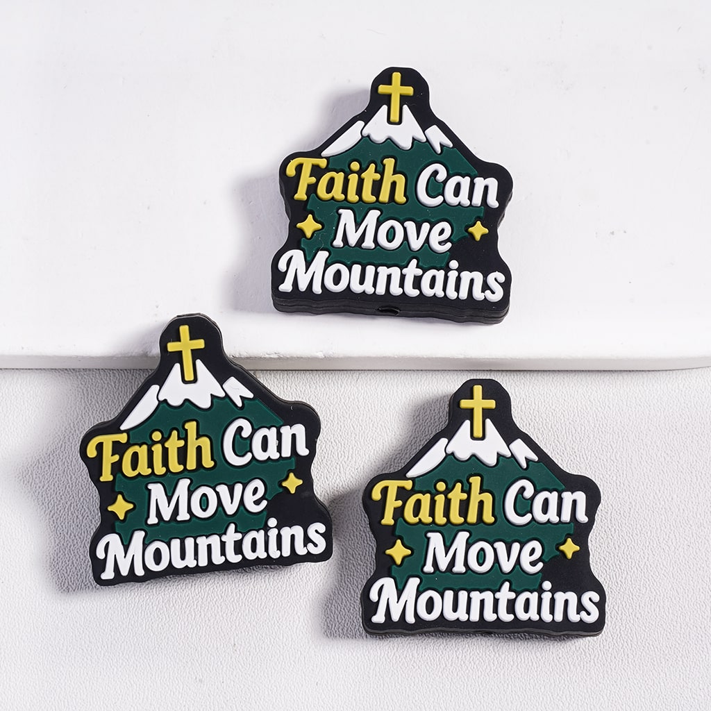 Three 'Faith Can Move Mountains' magnets on a white background