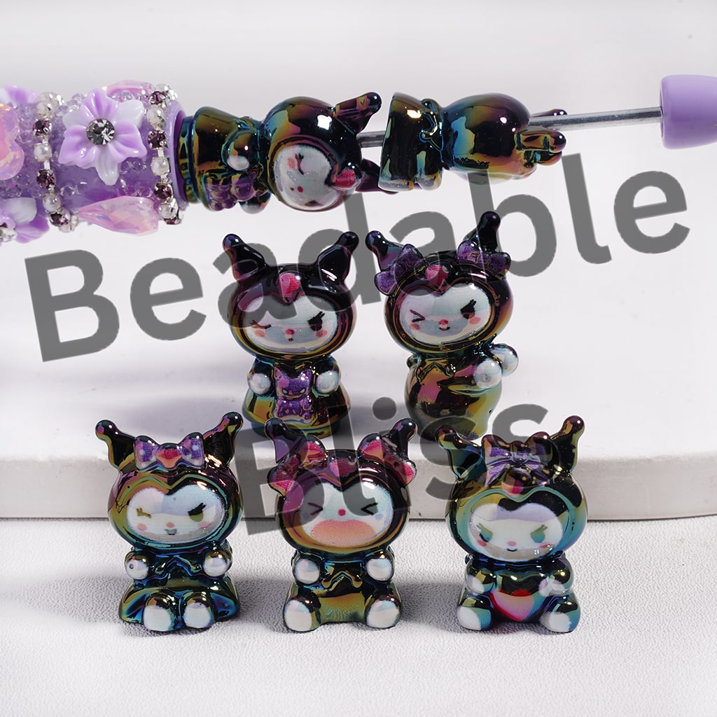 Colorful beaded hair accessories with cartoon character designs on a white background.