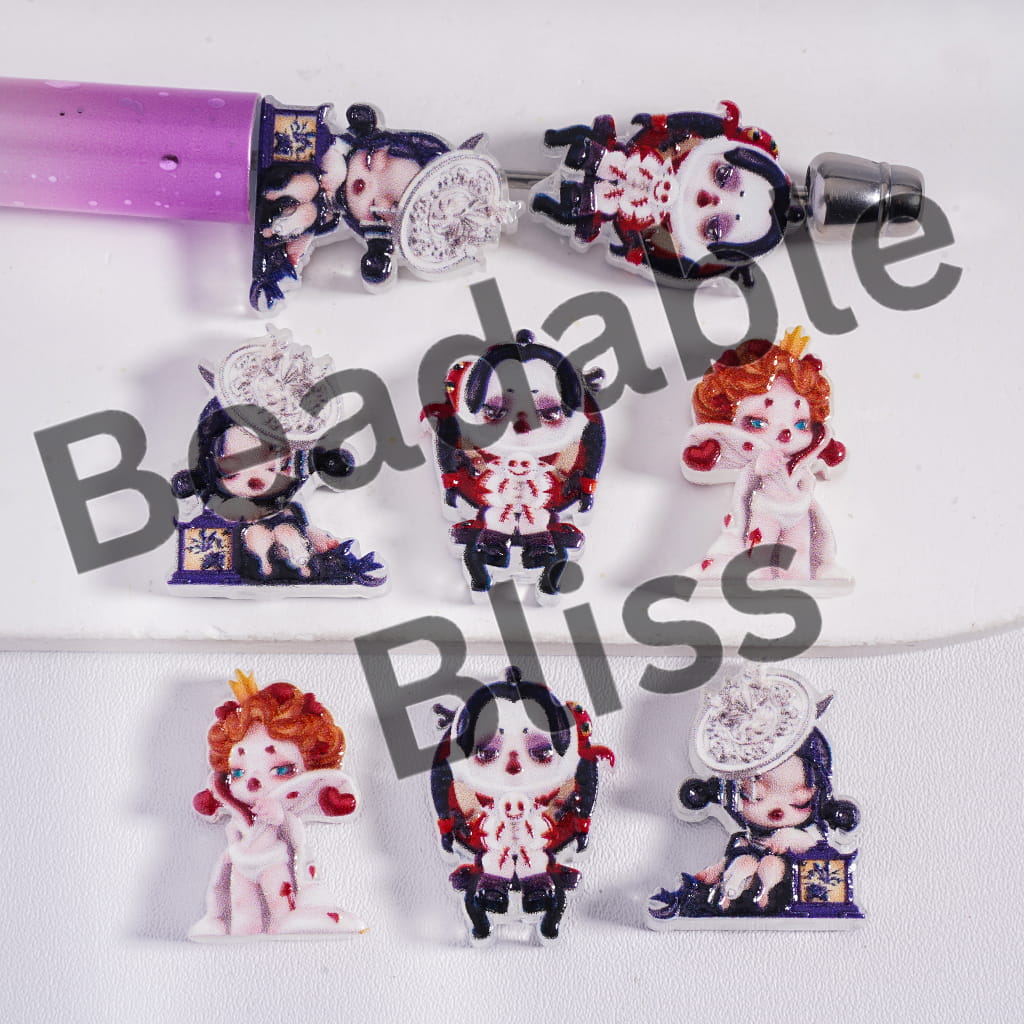 Set of decorative items with cartoonish characters on a white background, featuring the brand 'handsontable'.