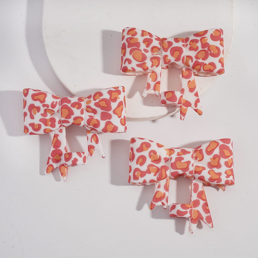 Food‑Grade Silicone Bowtie Straw Topper with Pink & Orange Leopard Print