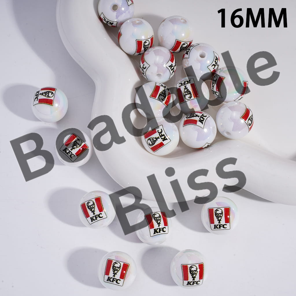 White beads with KFC logo on a white surface, branded 'handsontupply.com'.