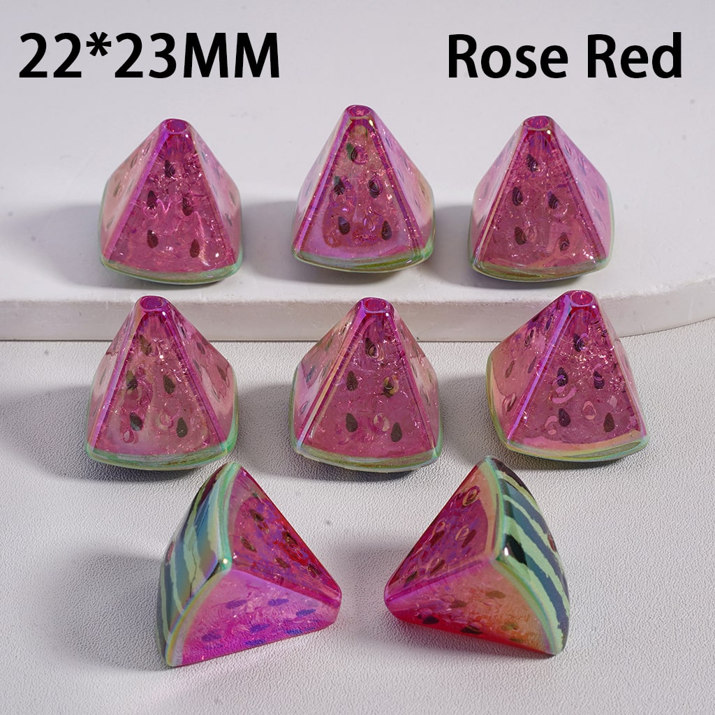 Pink triangular beads with watermelon pattern on a white background