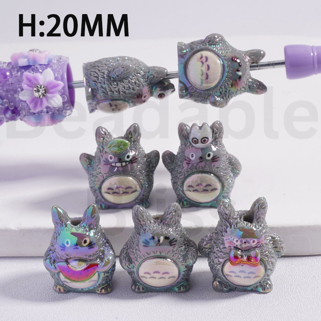 Set of small figurines resembling a popular character on a white background with 'beadablebliss' branding.
