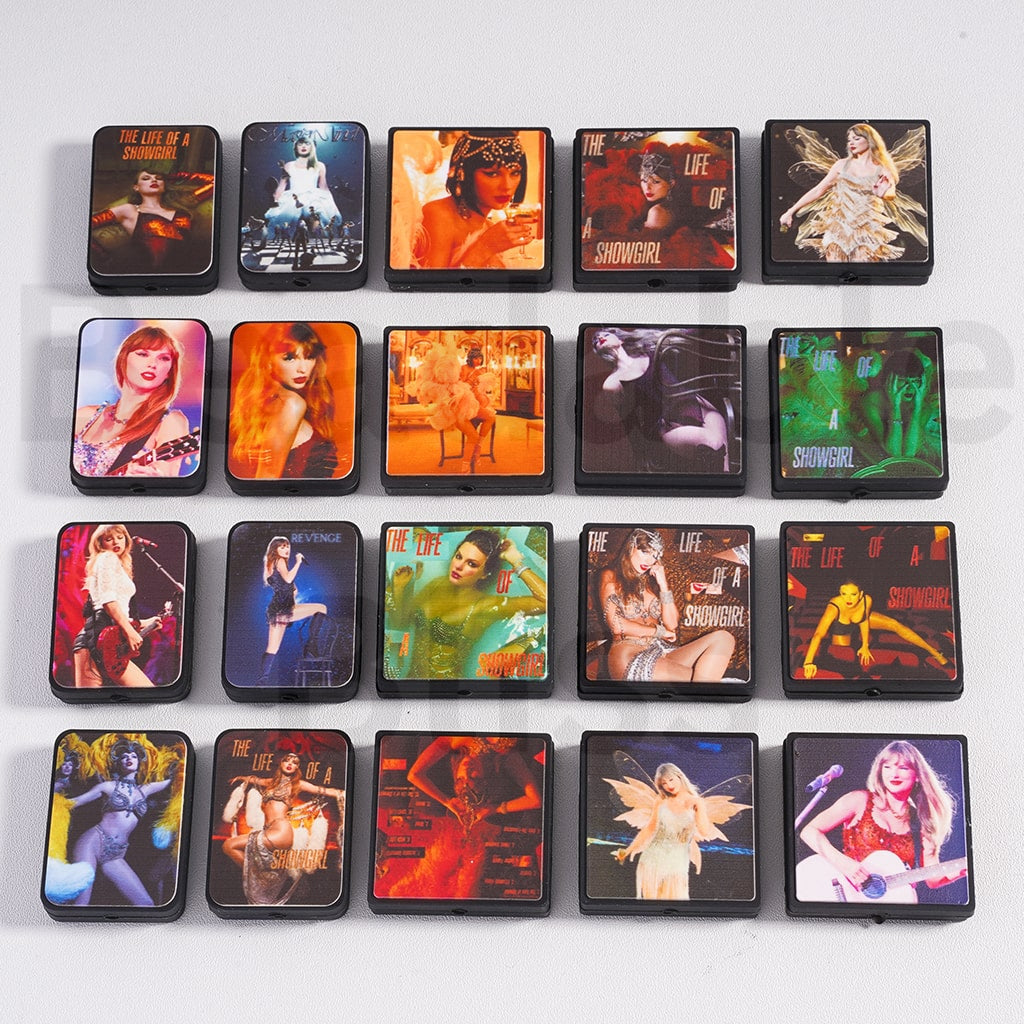 Collection of small rectangular boxes with colorful designs on a white background