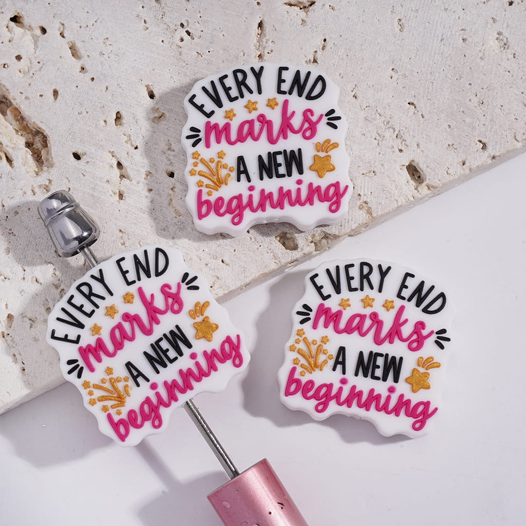 White Silicone Focal Beads with Black & Pink Text "EVERY END MARKS A NEW beginning" and Star in Gold Glitter