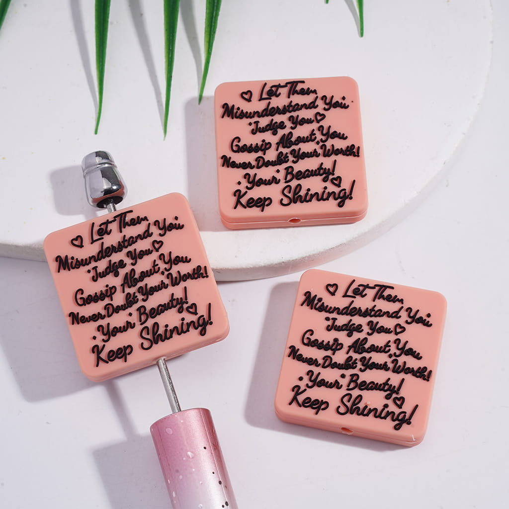 Flat Square Shape Light Pink Silicone Focal Beads with Black Text "Let Them Misunderstand You Judge You Gossip About You Never Doubt Your Worth Your Beauty Keep Shining"