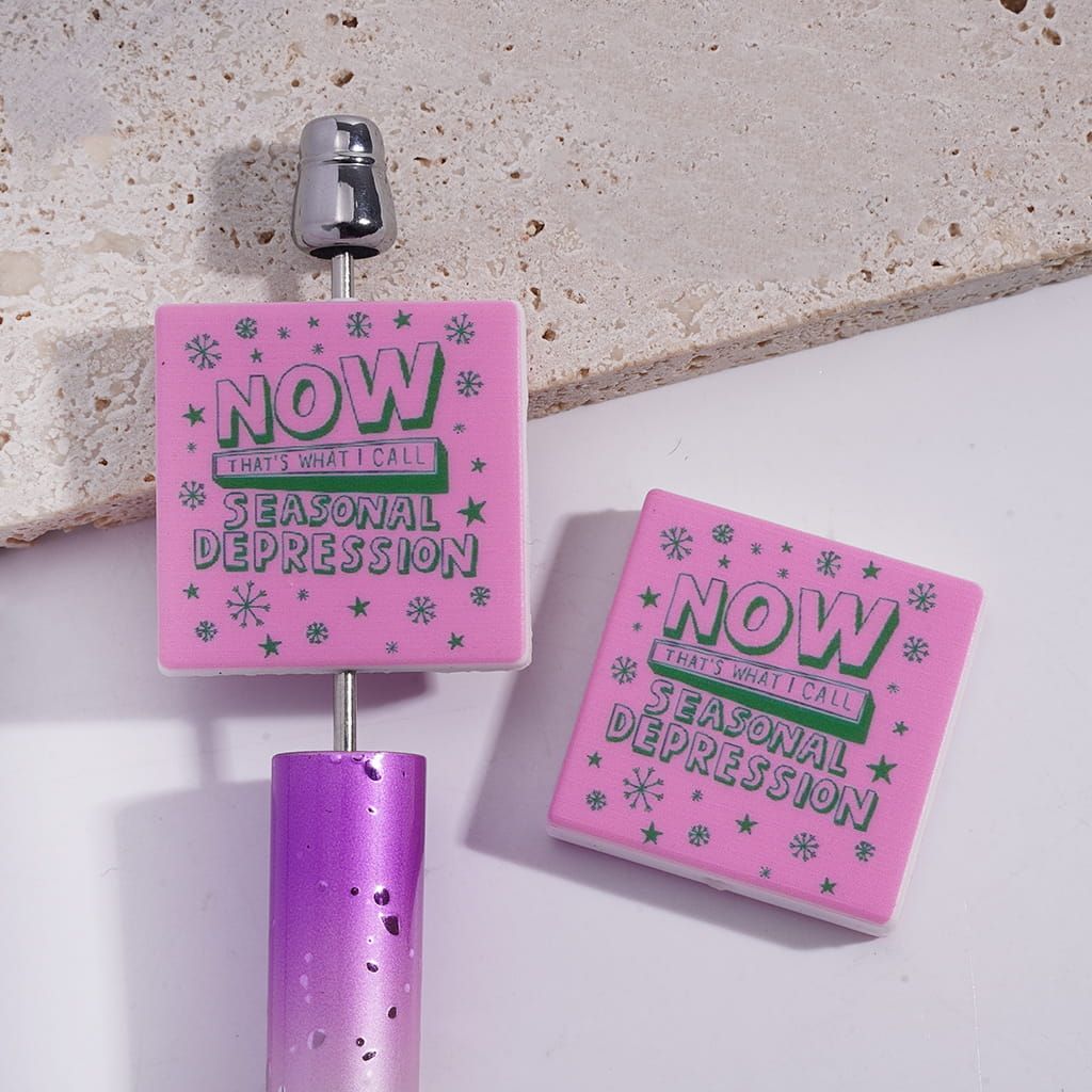 Pink Background Flat Square Shape Silicone Focal Beads with Snowflake Star and Text “NOW THAT’S WHAT I CALL SEASONAL DEPRESSION”,