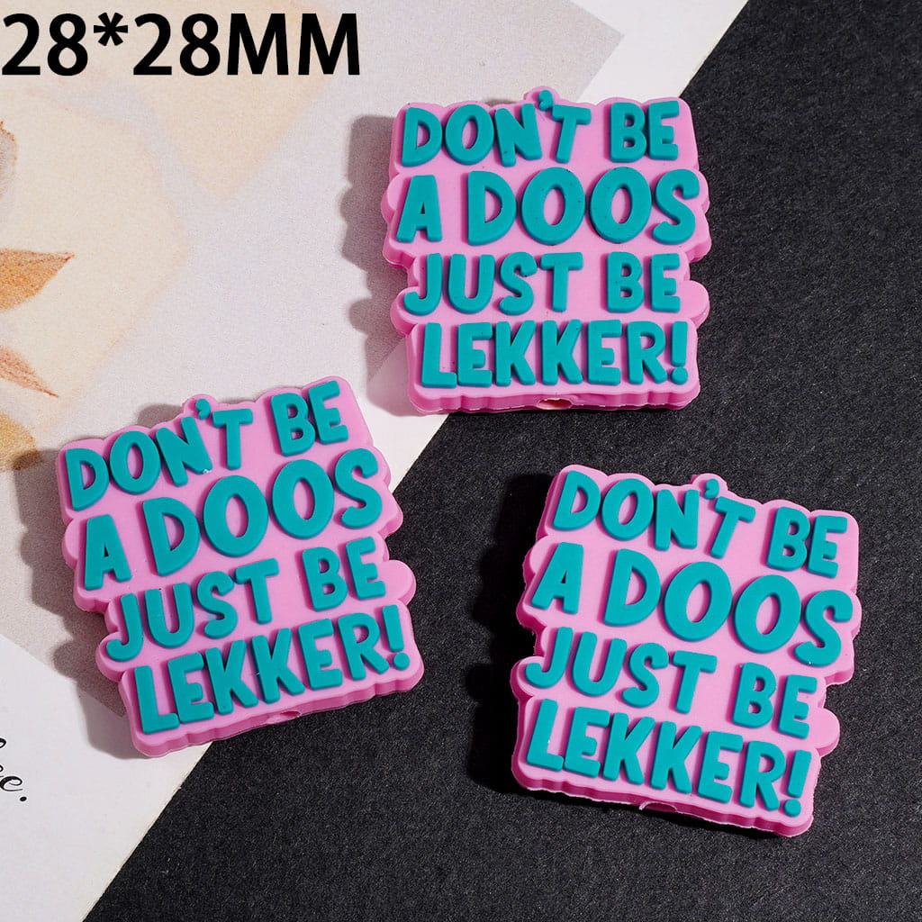 Silicone Focal Beads with Teal Text "DON'T BE A HUMOR JUST BE LEKKER" on Pink Background, 28*28MM