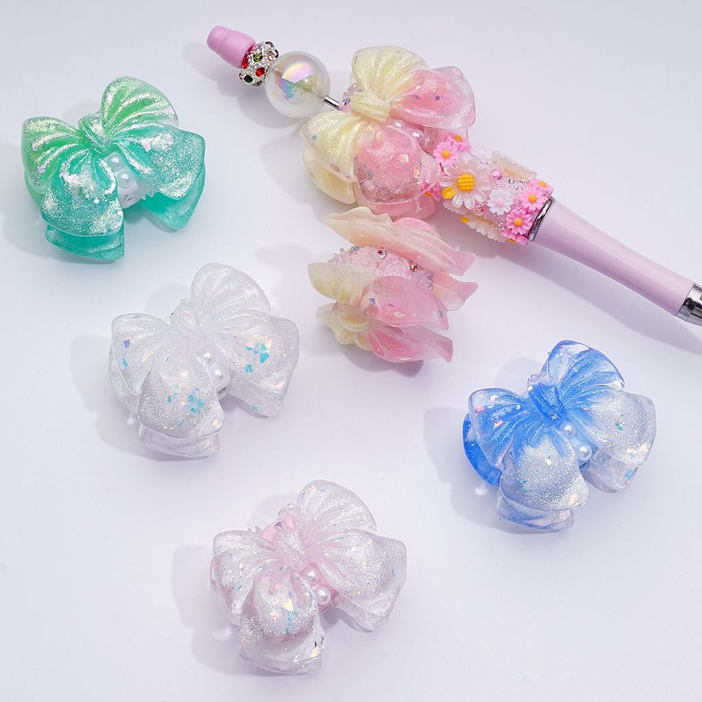 Sparkling Glitter Bowknot with Mini Floral Accents – Adorned with White Pearls, AB Rhinestones & Decorative Clay Beads 41*34MM
