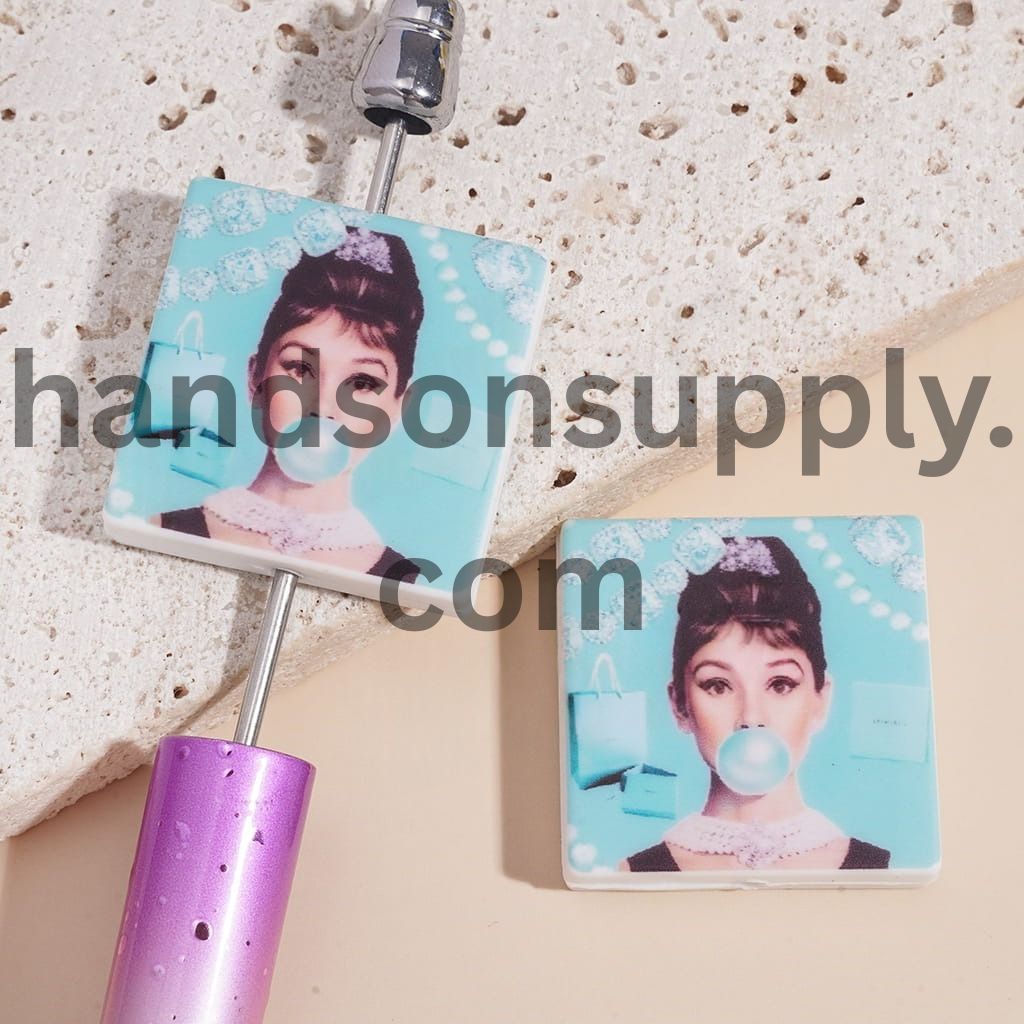 Renowned British Actress Blow Light Blue Bubble on Jewelry Handbag Background, Flat Square Shape Silicone Focal Beads