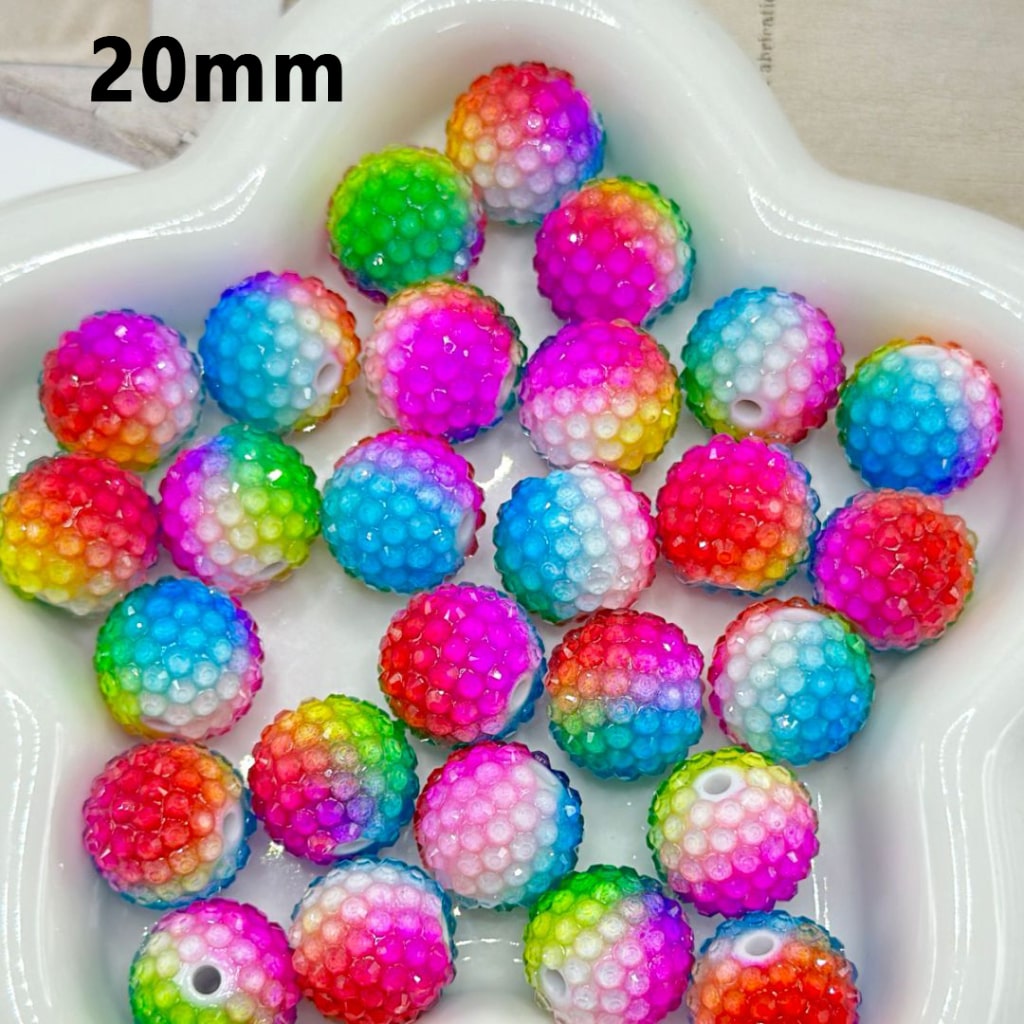 Colorful beaded balls on a white dish with '20mm' text.

