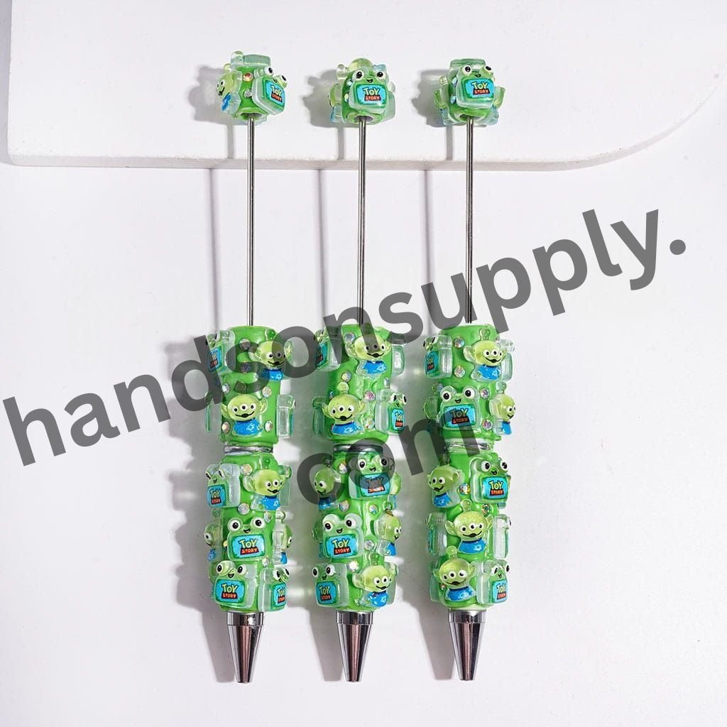 Colorful Toy Adventure Characters with Sparkling AB Rhinestones on Green Beadable Clay Pen