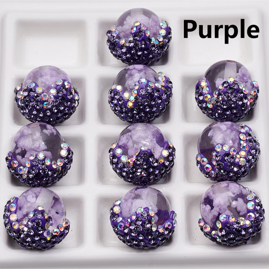 Purple decorative items with glitter on a white tray, labeled 'Purple'.

