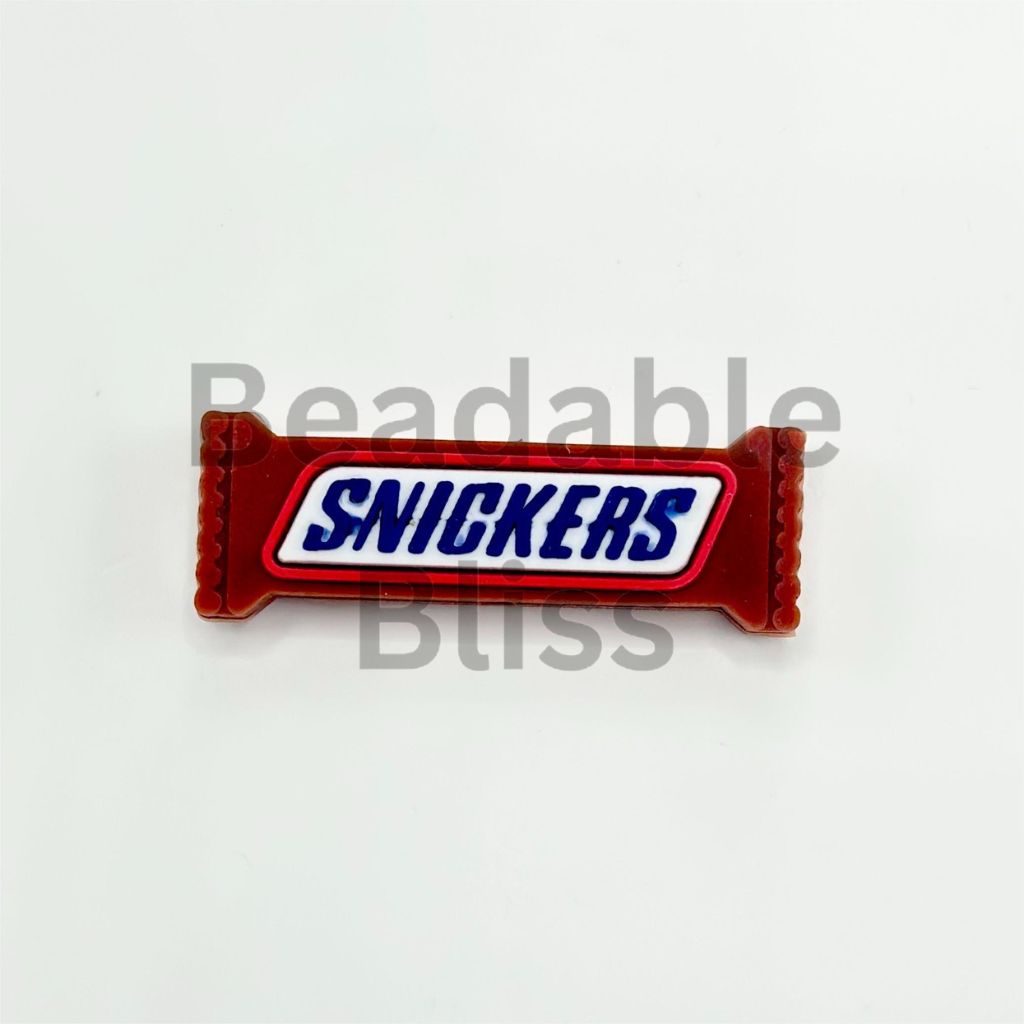 Snickers candy bar patch on a white background

