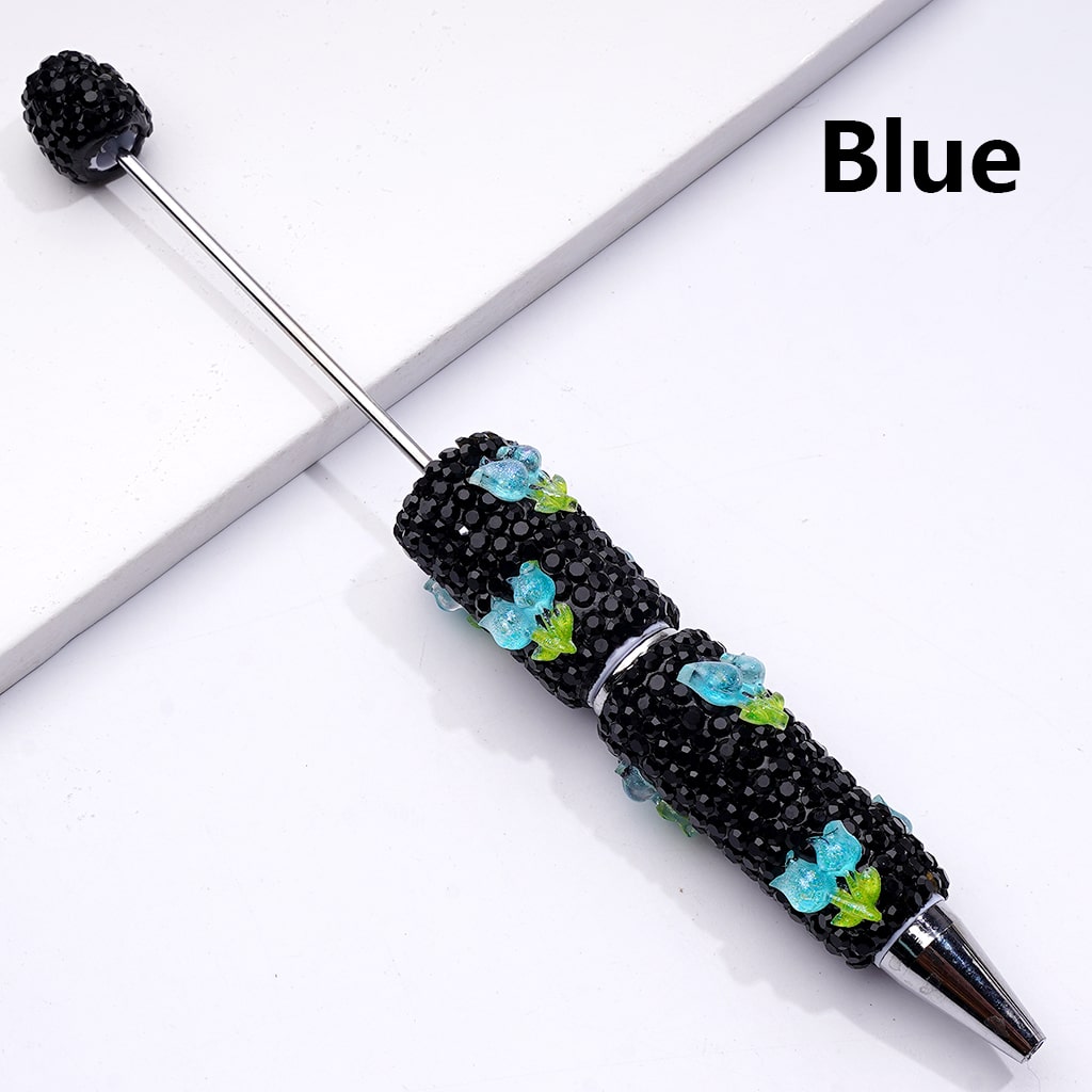 Decorative pen with black and blue accents on a white background


