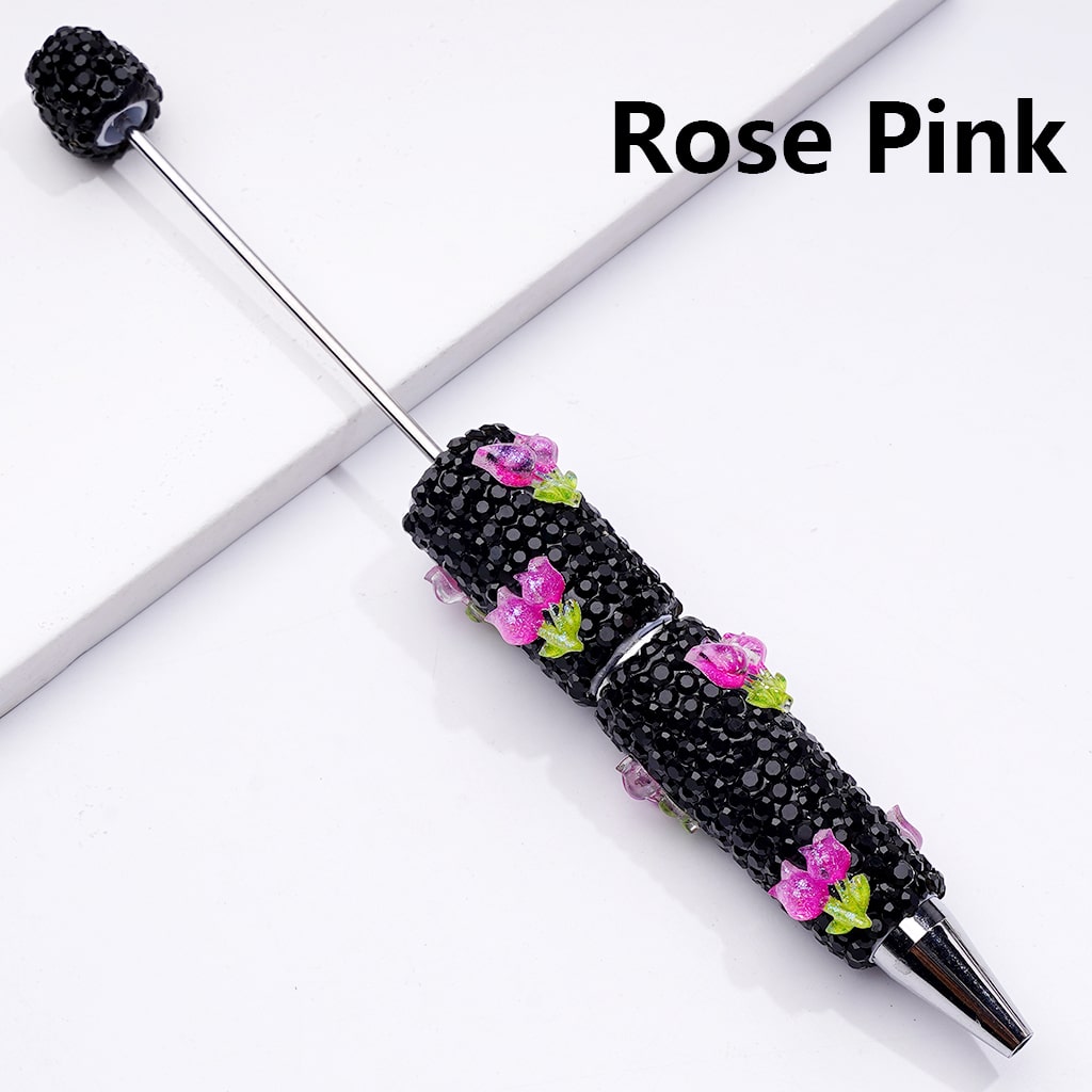 Decorative pen with rose pink flowers on a white background

