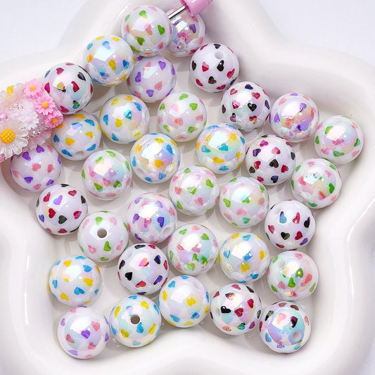 Vibrant UV-Coated White Acrylic Beads with Multi-Color Mini Heart Prints, 16MM – Random Mix
