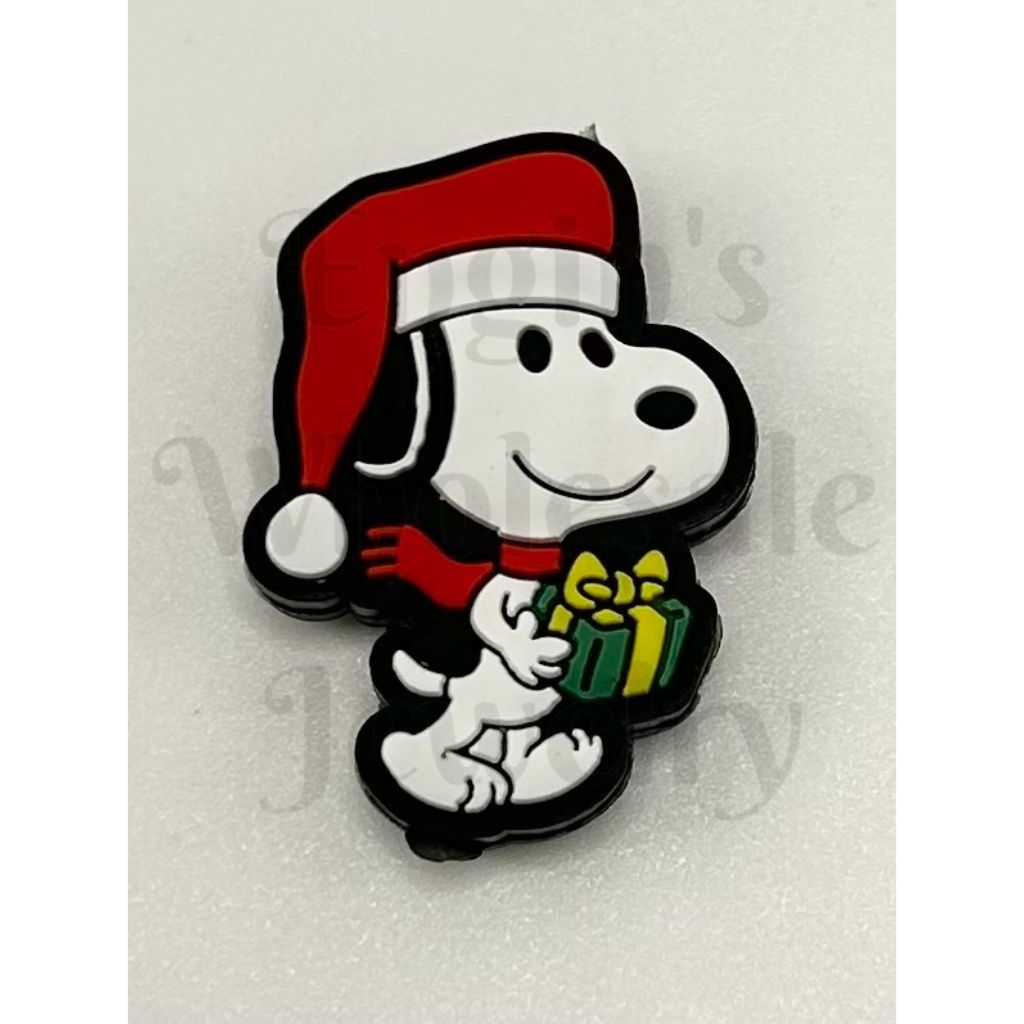 Snoopy wearing a Santa hat and holding a gift on a white background

