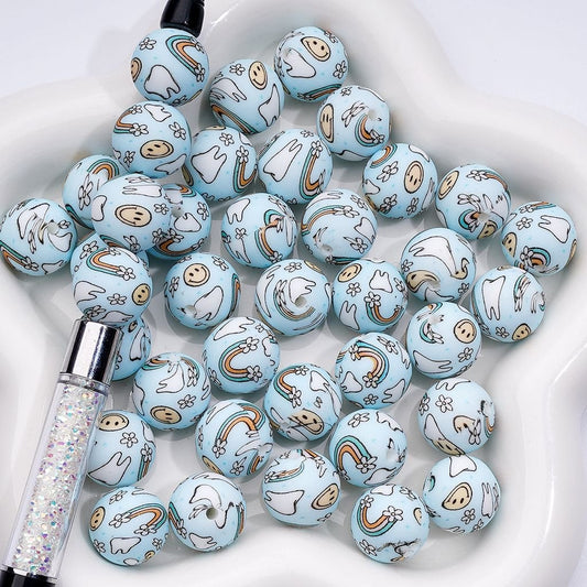 Smile Face with Rainbow Flowers & Teeth Light Blue Printed Silicone Beads, 15MM (Number Z-00221)