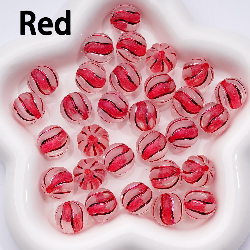 Red glass beads on a white plate with 'Red' text above.

