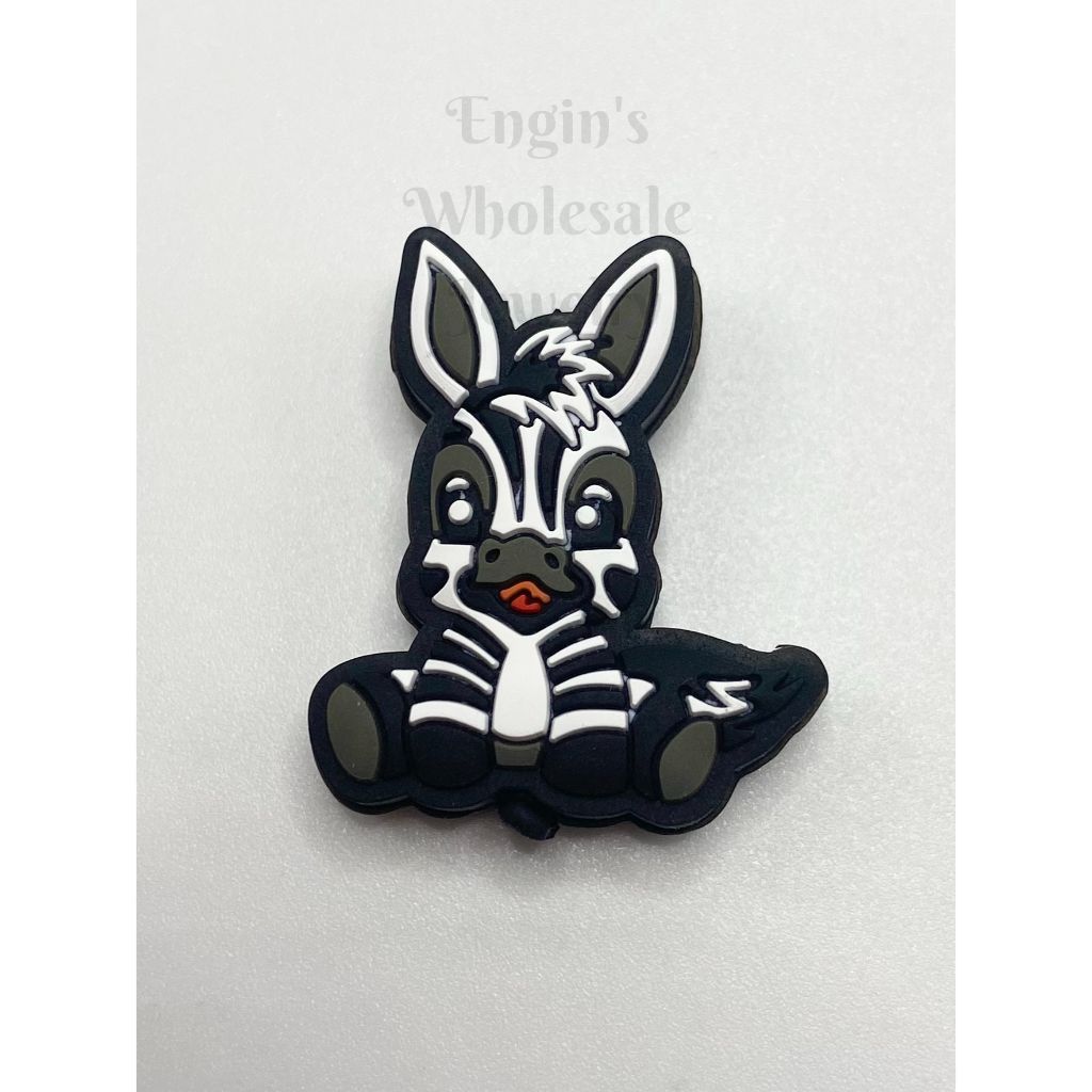 Zebra-shaped toy on a white background

