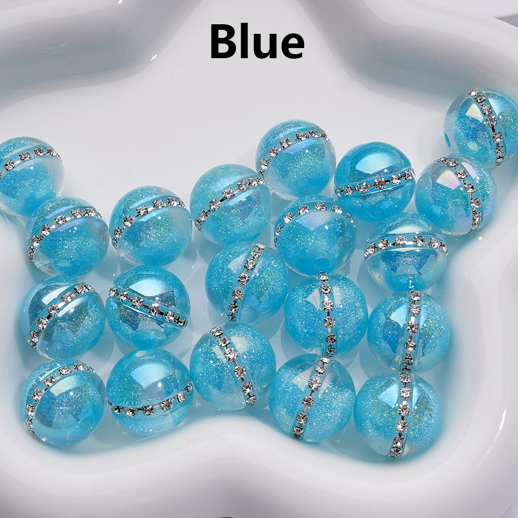 Blue beads with silver accents on a white background

