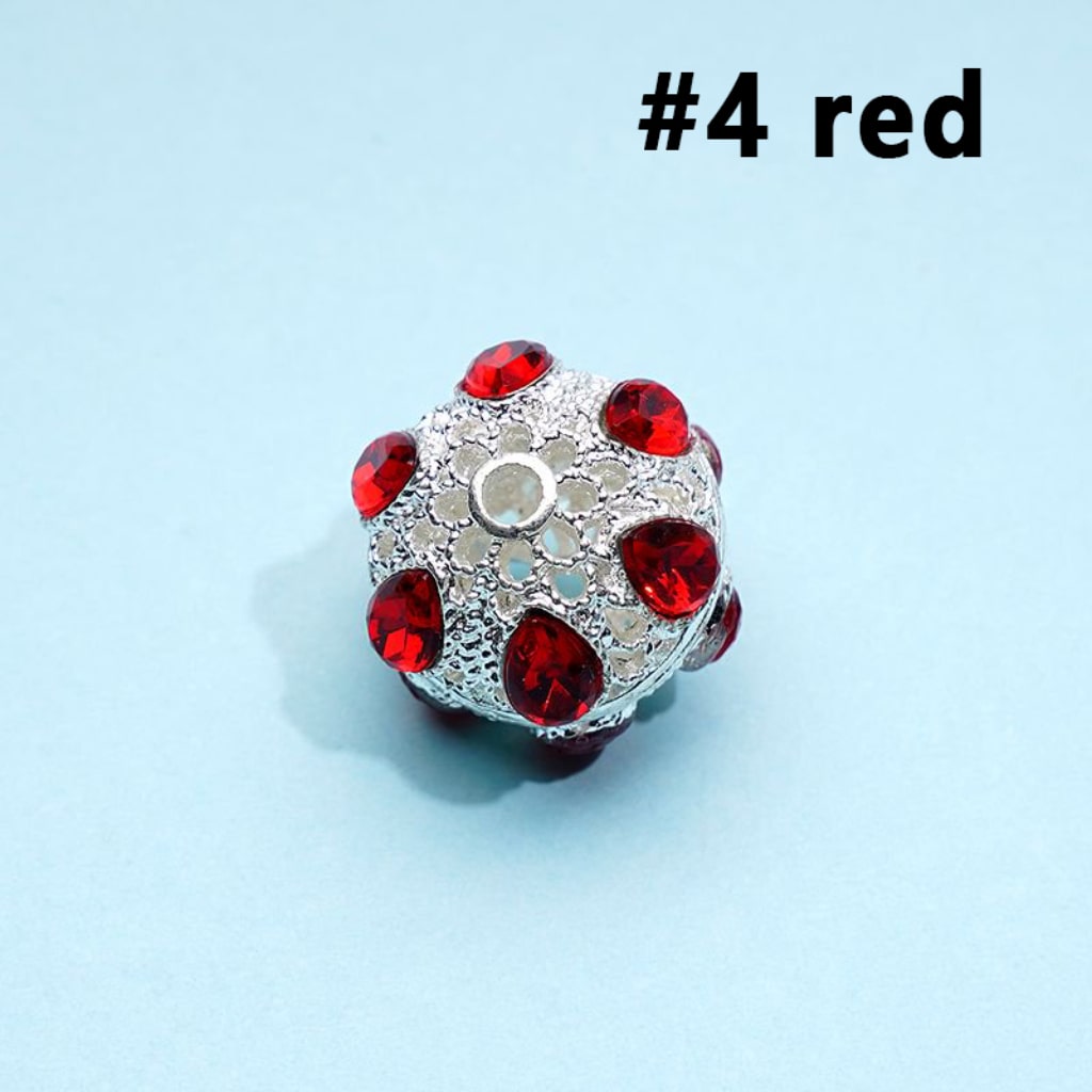 A collection of silver alloy beads with colorful rhinestones, approximately 16mm in size, displayed on a blue background.

