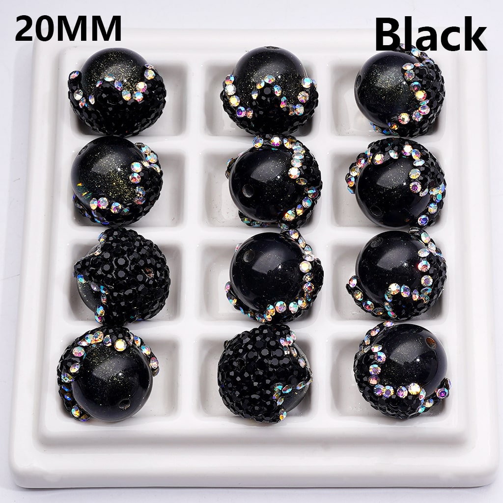 Black beads with colorful rhinestones on a white tray, labeled '20MM Black'.