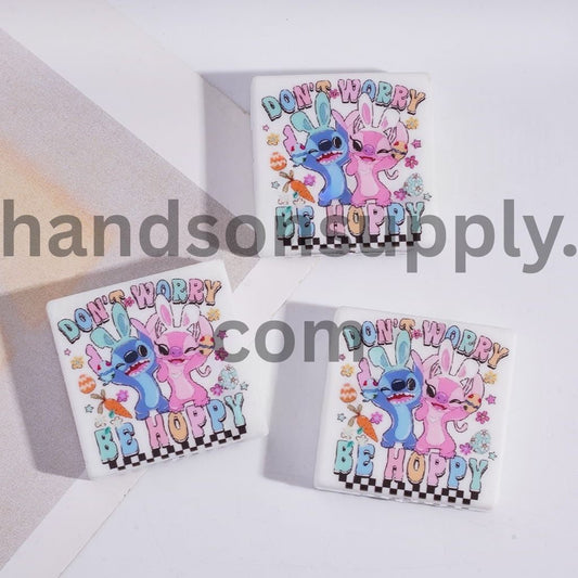 Blue Pink Monster Character Holding Colorful Egg Easter, Flat Square Shape with Text "DON'T WORRY BE HOPPY" Silicone Focal Beads