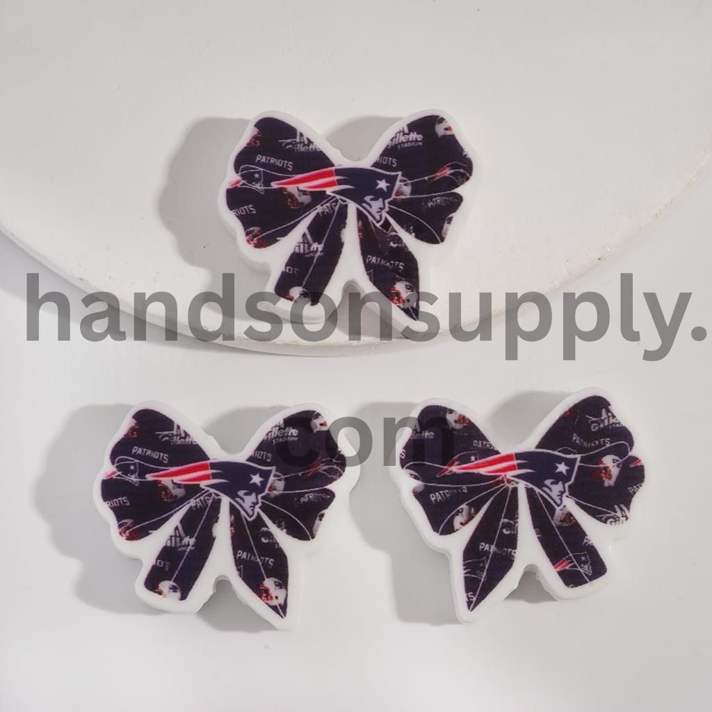 NE Football Pattern on Bow Tie Shape Silicone Focal Beads