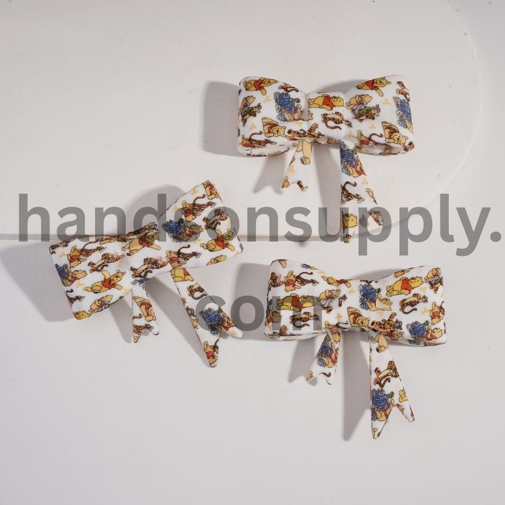 Food‑Grade Silicone Bowknot Straw Topper with Classic Cartoon Animal Prints