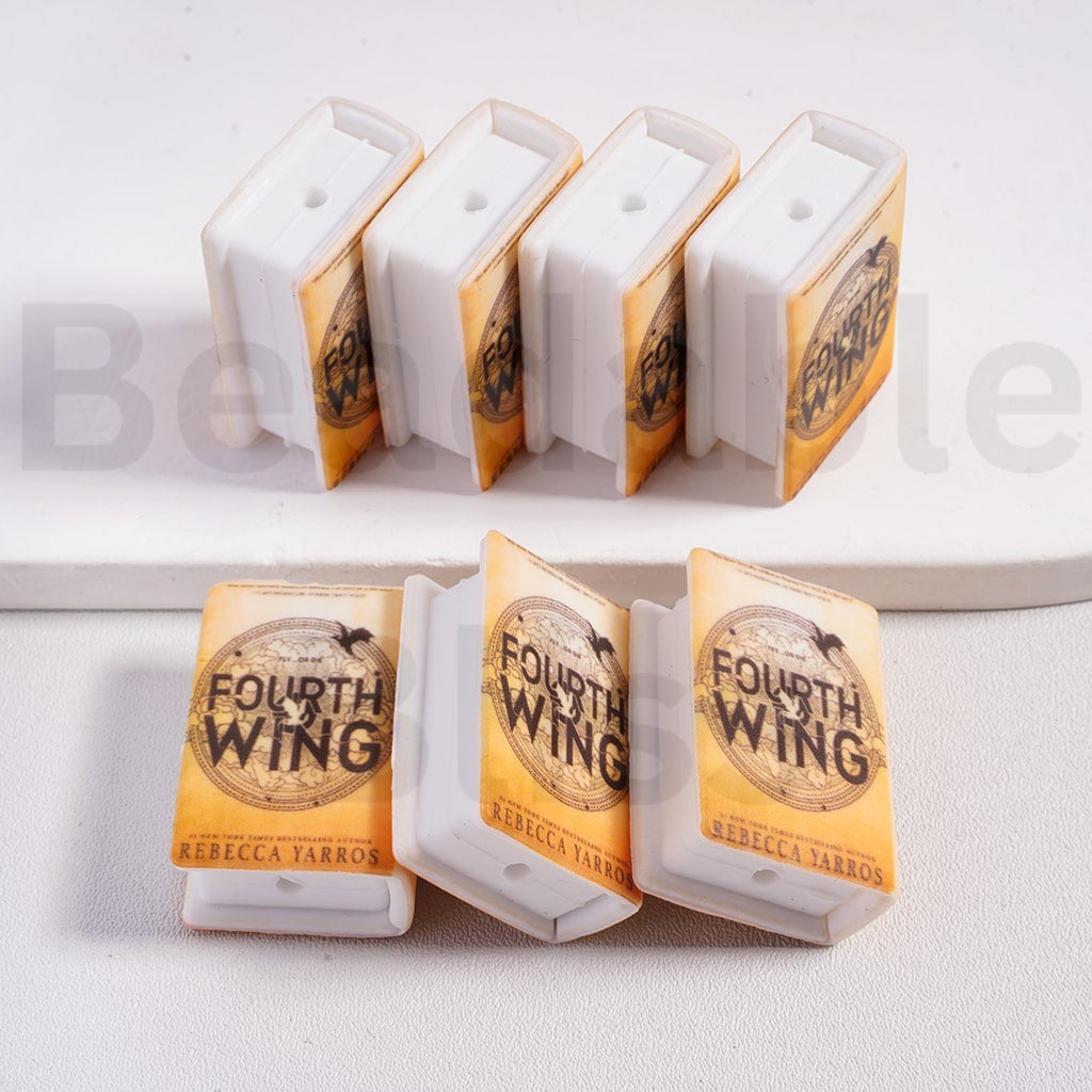 Four 'Fourth Wing' product packages on a white surface with 'beadablebliss' branding.

