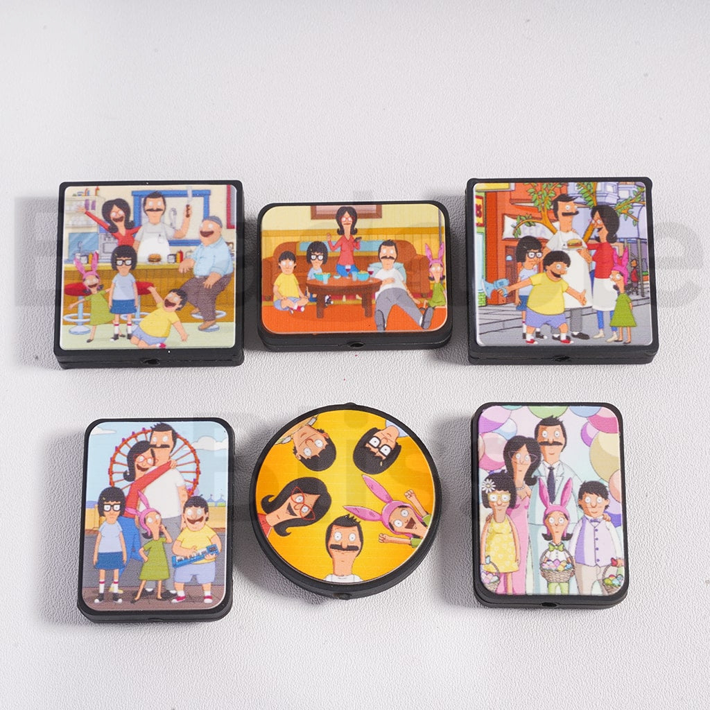 Set of six small rectangular boards with cartoon family illustrations on a white background

