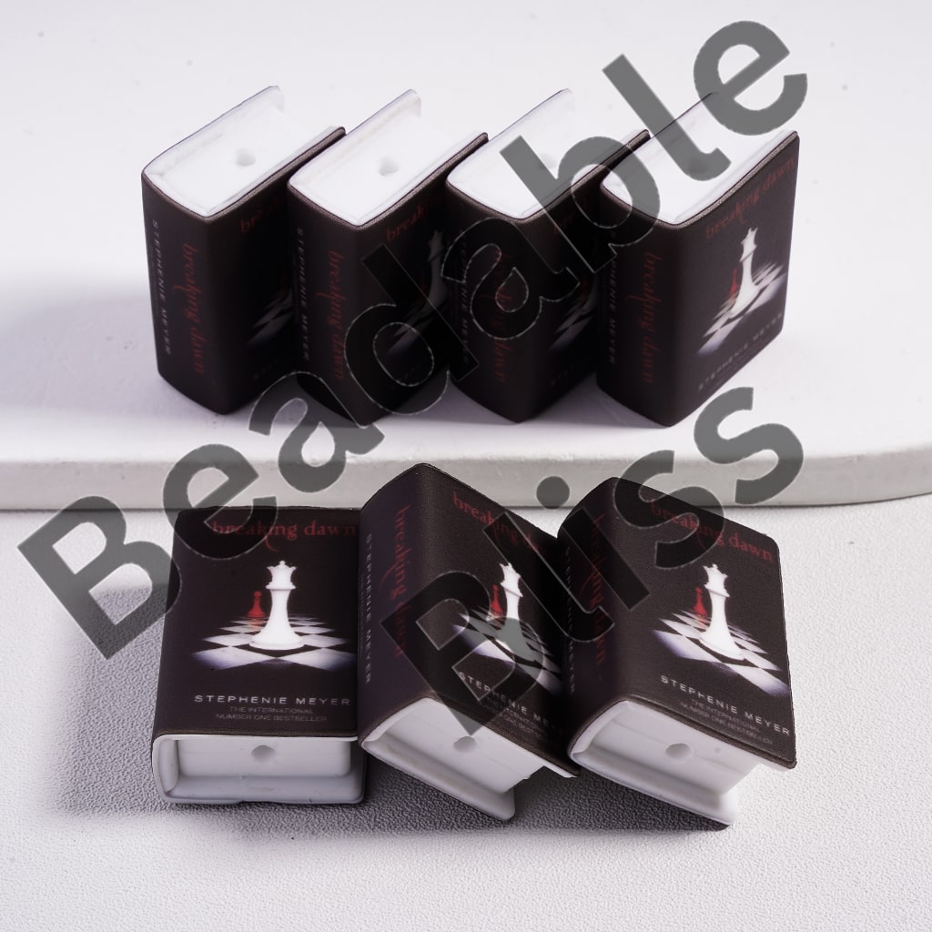 Three books with a white cover and black spine on a white background

