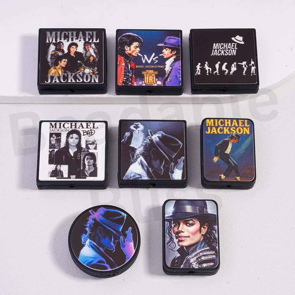 Collection of Michael Jackson-themed items on a white background

