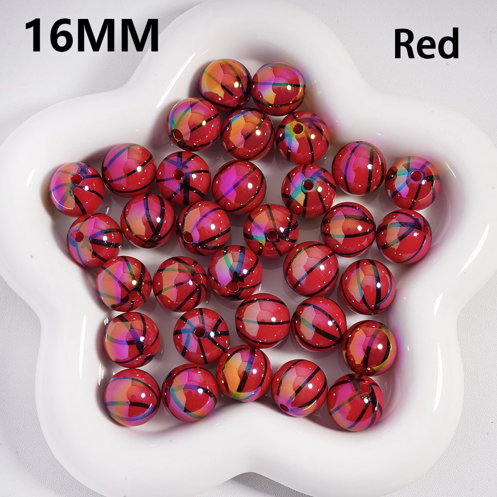 16MM red beads with multicolor patterns on a white dish

