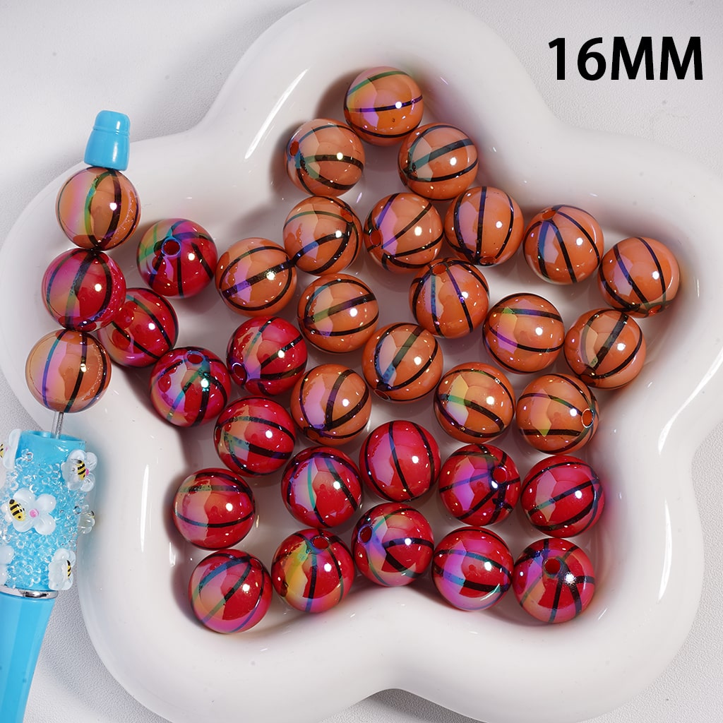 Colorful beads on a white dish with a blue tool, labeled '16MM'.

