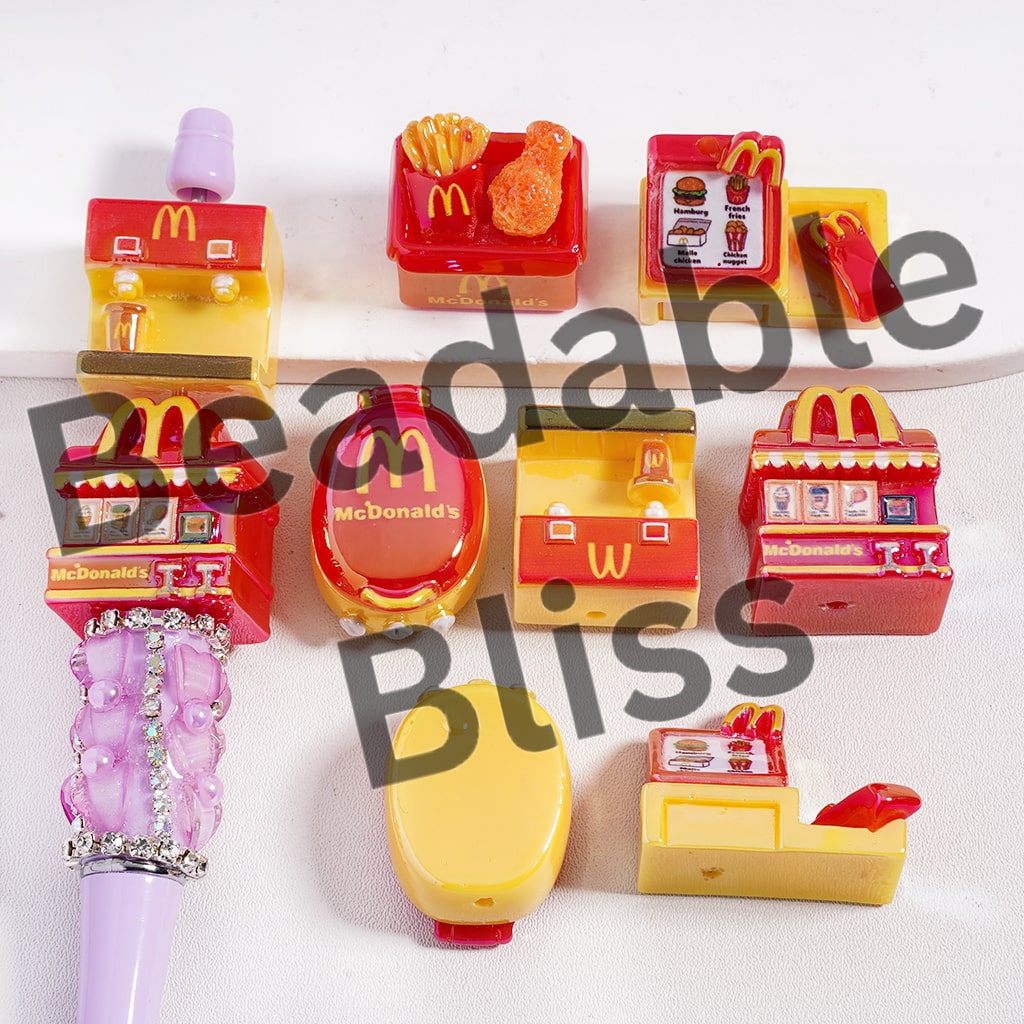 Collection of McDonald's-themed stationery items on a white background