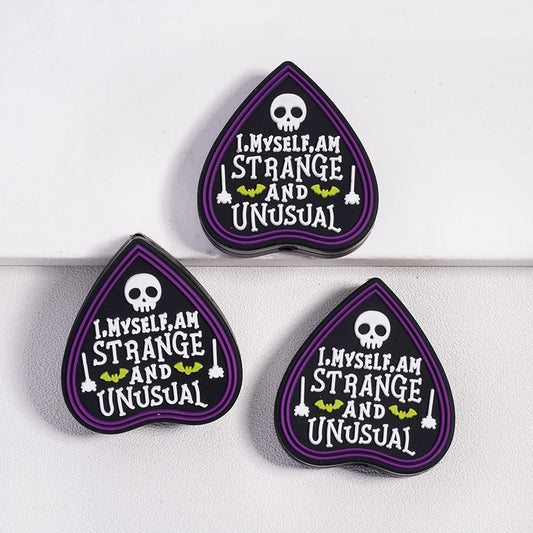 "I MYSELF AM STRANGE AND UNUSUAL" Text with Green Bats & Skull Silicone Focal Beads